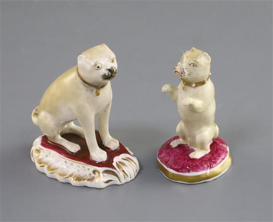 Two Rockingham porcelain figures of pugs, c.1830, H. 6.7cm and 6.4cm